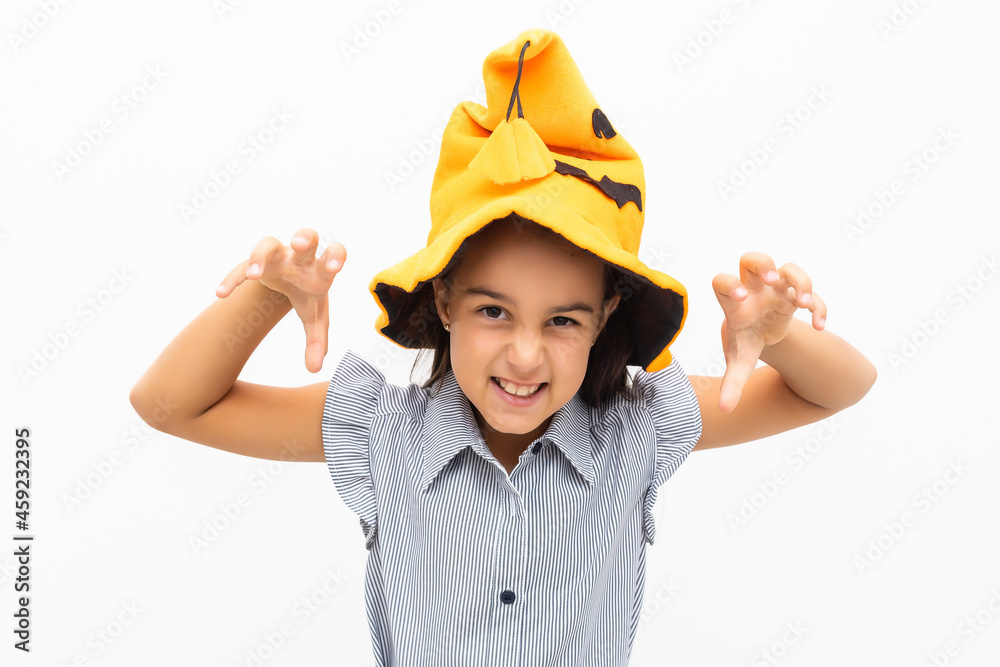 little girl in a witch hat on a white background little girl in a witch hat on a white background