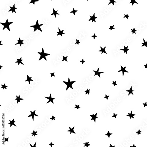 Seamless pattern of hand-drawn stars. Vector holiday background