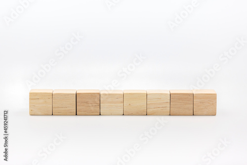 Eight blank wooden block cubes on a white background for your text.