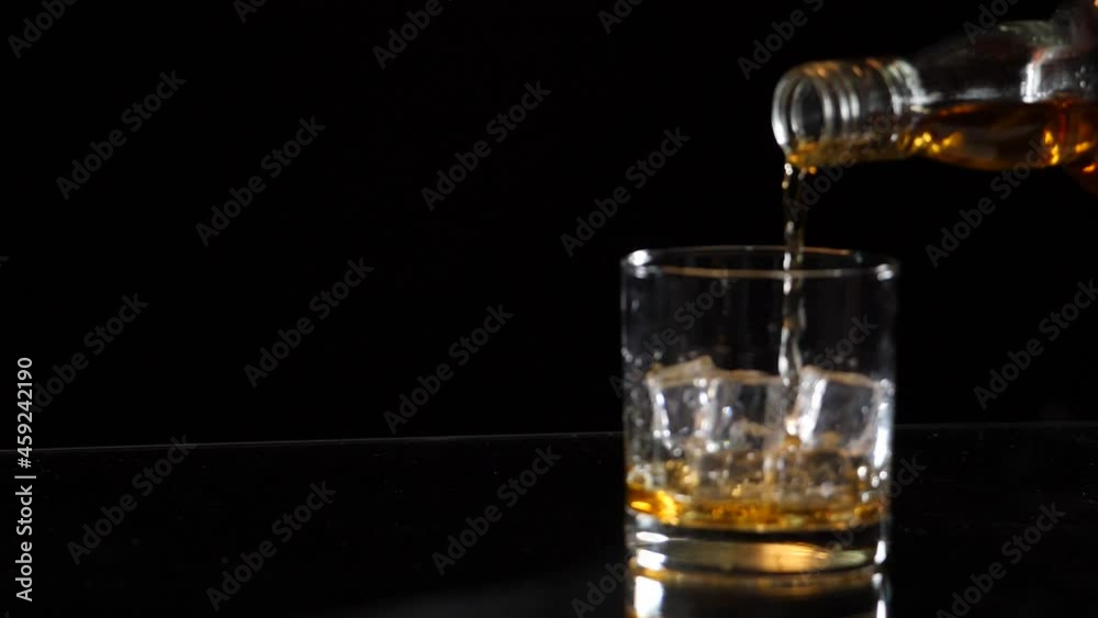 Barman pouring whiskey whiskey glass beautiful night