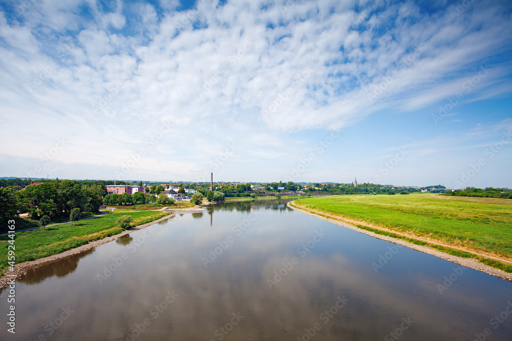 Dresden suburbs, river with clouds reflection Dresden suburbs, river with clouds reflection