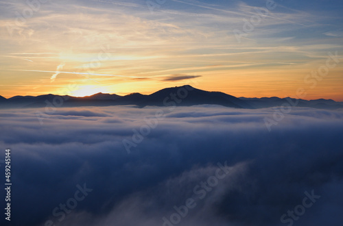 Sunset over fog in the mountains