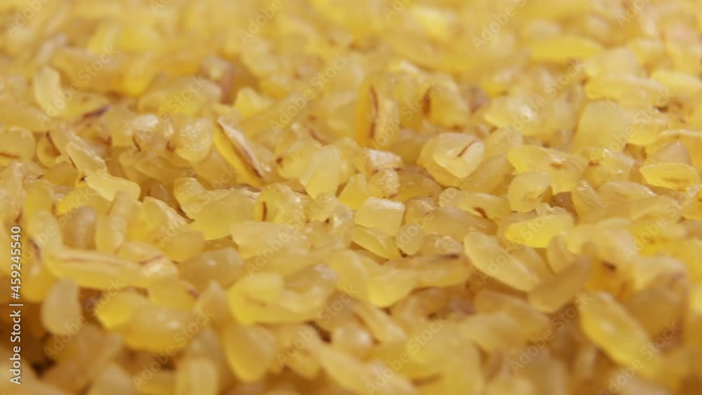 Bulgur grains close up slowly rotate Bulgur grains close up slowly rotate