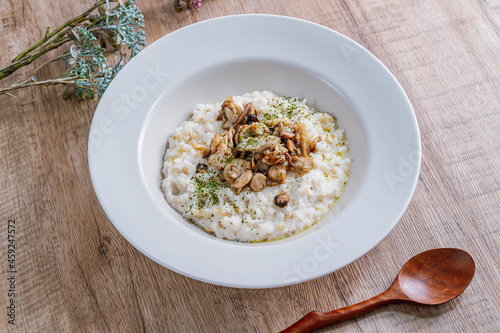 Mushroom risotto in a white bowl