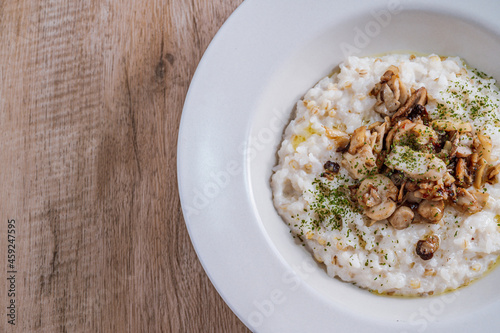 Mushroom risotto in a white bowl