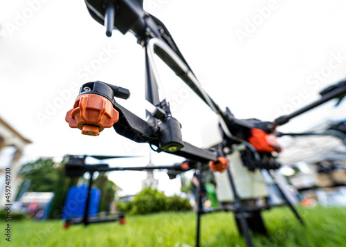 Fototapeta Naklejka Na Ścianę i Meble -  Professional agriculture drone on the green field