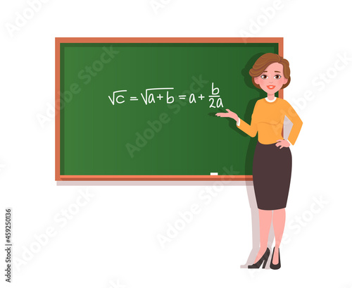Young female teacher at blackboard