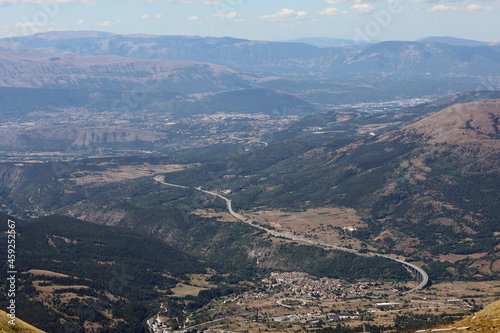 panorama of the wide valley of Abruzzo with the highway called A24 near the city of L AQUILA
