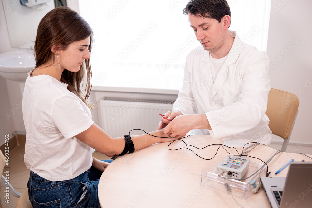 Fototapeta premium Patient nerves testing using electromyography at medical center