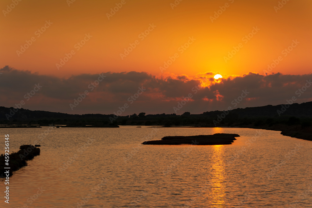 Sunset at the gialova lagoon. The gialova lagoon is one of the most important wetlands in Europe. Sunset at the gialova lagoon. The gialova lagoon is one of the most important wetlands in Europe.