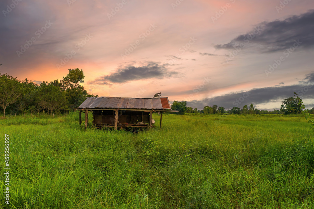 Old hut on sunset background. beautiful landscape. Old hut on sunset background. beautiful landscape.