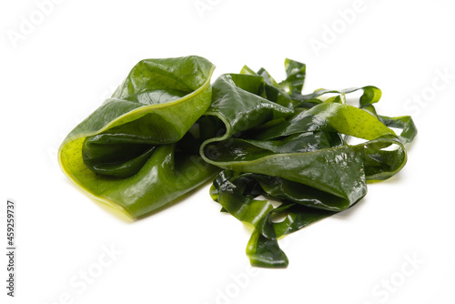 Fresh seaweed wakame isolated on white background. Healthy japanese food photo