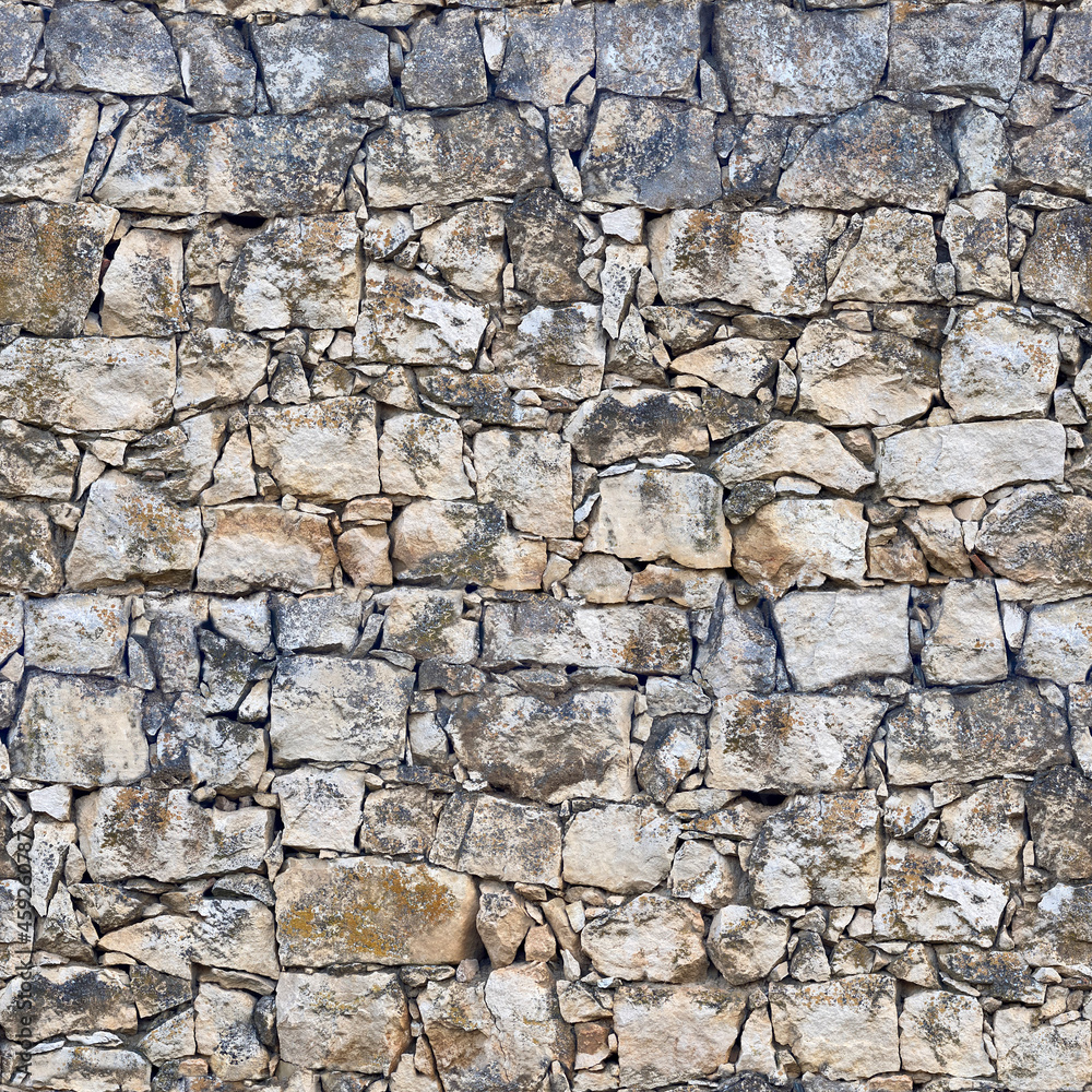 Natural stone wall. Seamless texture. Perfect tiled on all sides.
