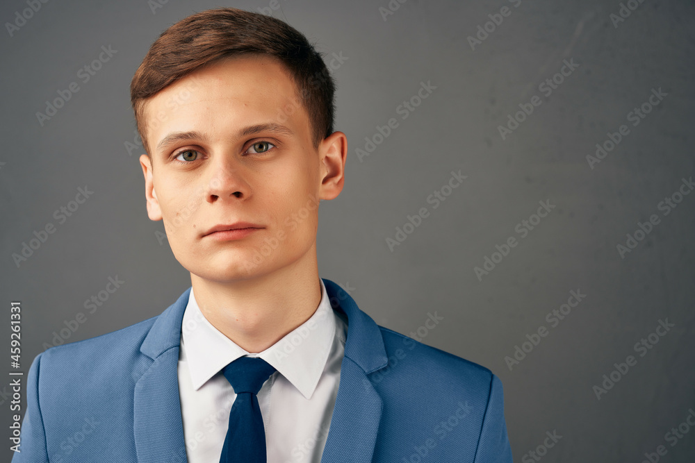 handsome business man in suit folded his hands in front of him work office handsome business man in suit folded his hands in front of him work office
