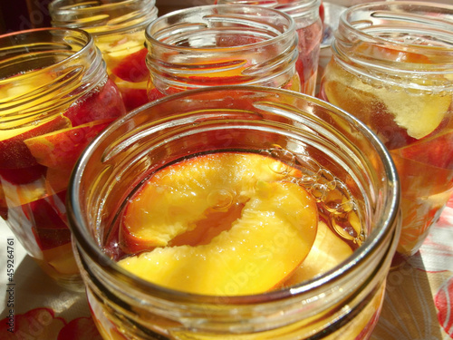 Peaches canned in glass jar, peach compote 