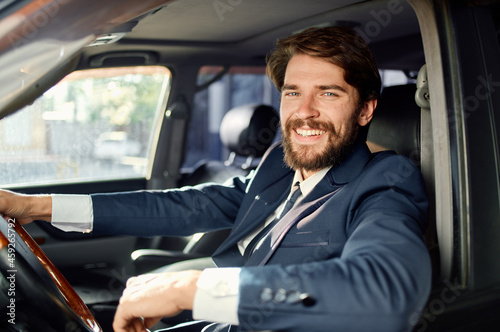 bearded man Driving a car trip luxury lifestyle communication by phone © SHOTPRIME STUDIO