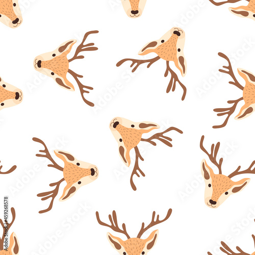 Christmas pattern with heads of reindeers on a white background. Vector illustration 