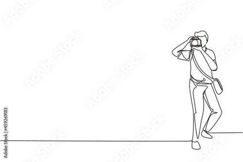 Single continuous line drawing man with camera and sling bag taking pictures. Paparazzi or journalist occupation, digital photography hobby. Dynamic one line draw graphic design vector illustration