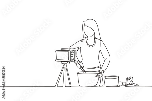 Single one line drawing woman in kitchen preparing dessert at home, stirring dough with spatula. Cooking live streaming. Blogger prepares meal online. Continuous line draw design vector illustration