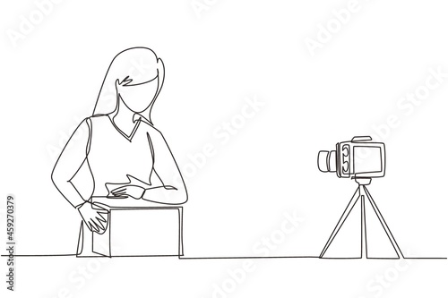 Continuous one line drawing beauty female show unboxing received package in live at home. Woman vlogger unboxing product and recording review on camera. Single line draw design vector illustration