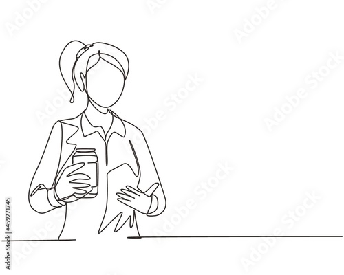 Single continuous line drawing young woman holding and showing soda refreshing a can sitting on couch in living room at home. Girl holds refreshing soda drink. One line draw design vector illustration