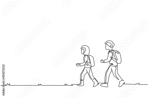 Continuous one line drawing little boy and girl goes camping in nature. Happy kids walking on camping ground, hiking, backpacks, adventure. Family leisure. Single line draw design vector illustration