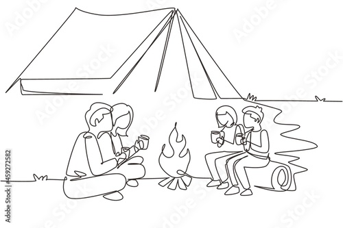 Single continuous line drawing happy family camping with campfire and drinking hot tea. Kids sitting on logs, mom dad sitting on ground in forest. Wild nature. One line draw design vector illustration