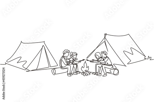 Single one line drawing friends sit on logs by campfire. Young tourists, campers in forest. Students playing guitar, roast marshmallows. Night camping entertainment. Continuous line draw design vector