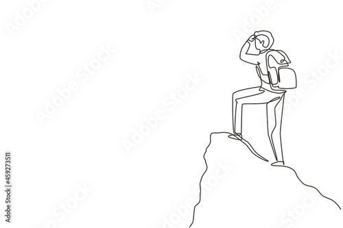 Single one line drawing man with backpack, traveller, explorer standing on top of mountain or cliff, looking on valley. Discovery, exploration, hiking. Continuous line draw design vector illustration