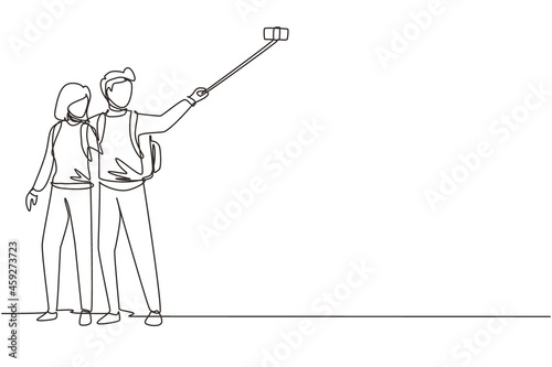 Single continuous line drawing couple tourist with backpack taking selfie over beautiful nature landscape background. Man and woman hiking nature trip. One line draw graphic design vector illustration