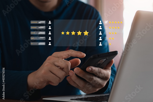 User give rating to service experience on online application, Customer review satisfaction feedback survey concept, Customer can evaluate quality of service leading to reputation ranking of business.