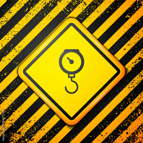 Black Hand scale spring mechanical icon isolated on yellow background. Warning sign. Vector