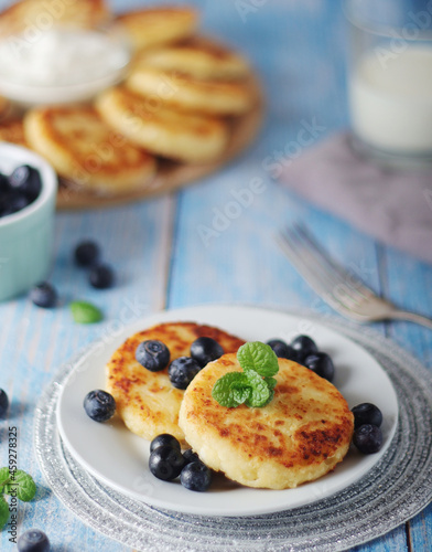 Cottage cheese pancakes - traditional Russian syrniki 