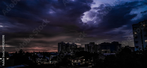 timelapse of clouds over city
