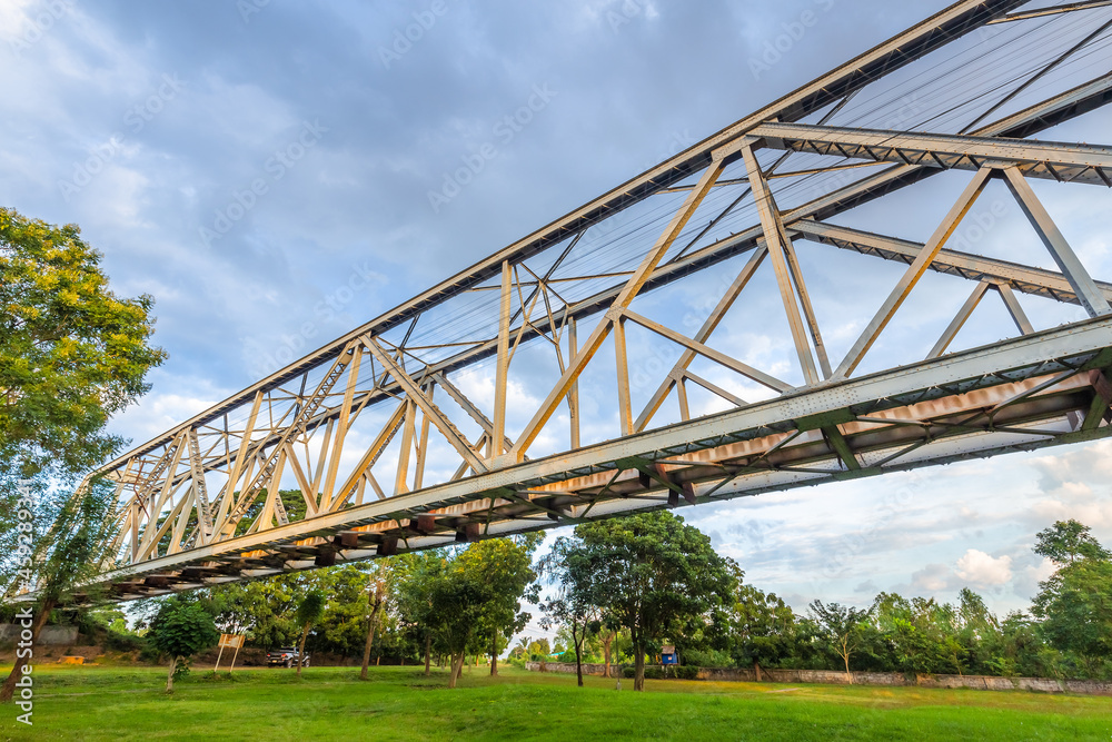 Old railway bridge across the field in countryside at Ban Dara, Pichai District, Uttaradit, Thailand