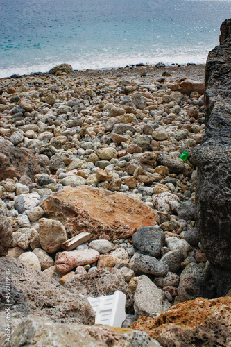 beach pollution in tuscany - mediterranean sea photo