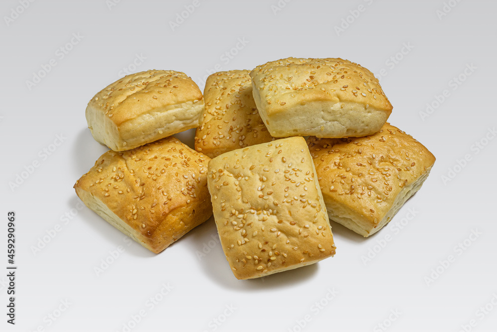Fresh golden buns with sesame seeds Fresh golden buns with sesame seeds