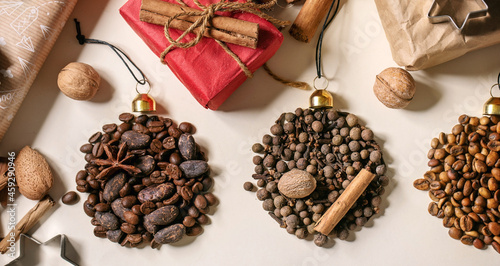 Aromatic spices collection and different coffee beans as Christmas balls