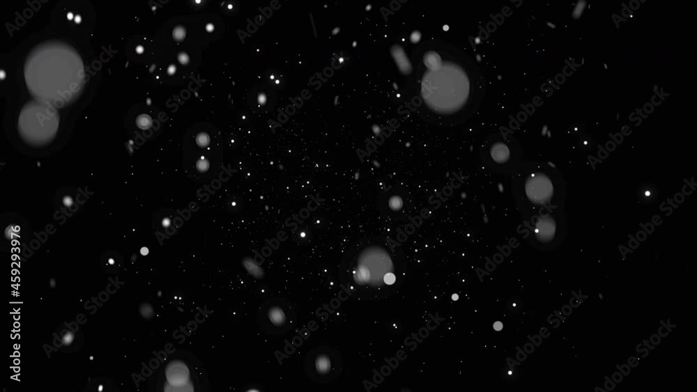 Defocused and blured snowflakes whirl and glow on black background. Snow overlay in 4K. Alpha channel Defocused and blured snowflakes whirl and glow on black background. Snow overlay in 4K. Alpha channel