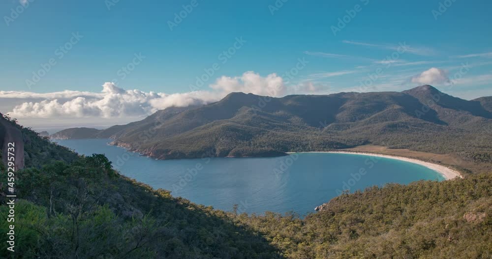 Time lapse View of Wineglass Bay and beach at the Wineglass bay Lookout in the Freycinet national Park,Tasmania, Australia Time lapse View of Wineglass Bay and beach at the Wineglass bay Lookout in the Freycinet national Park,Tasmania, Australia