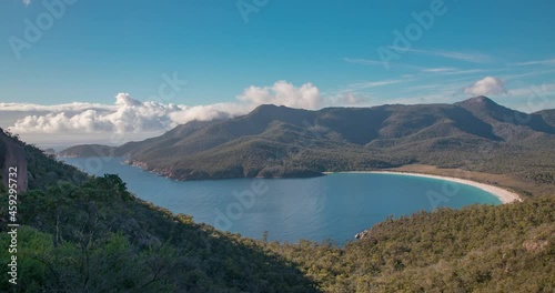 Time lapse View of Wineglass Bay and beach at the Wineglass bay Lookout in the Freycinet national Park,Tasmania, Australia photo