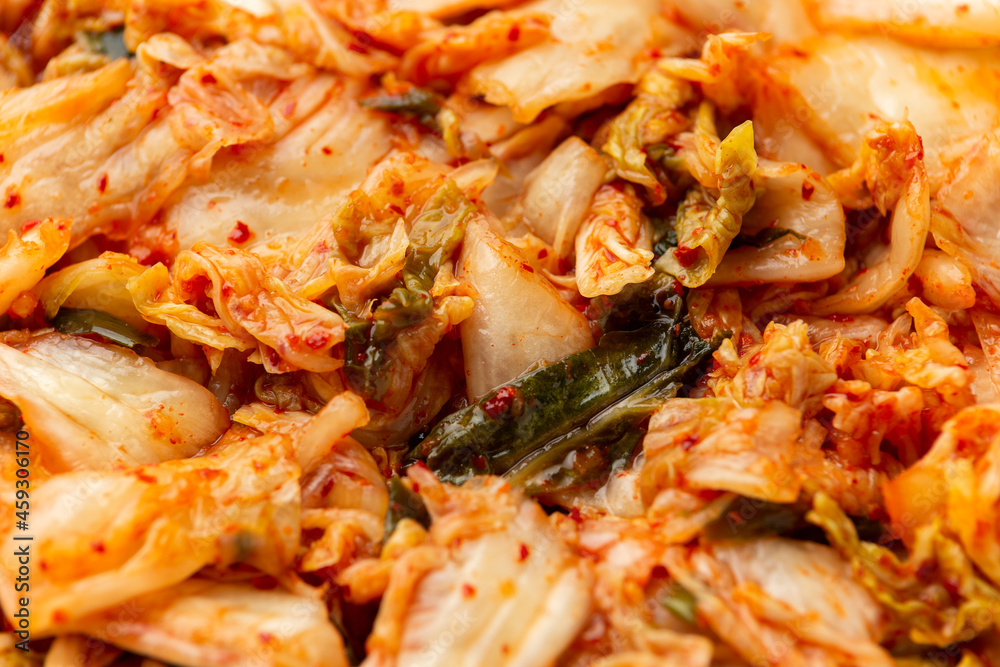Traditional Korean Kimchi Cabbage in white bowl. Healthy food. Traditional Korean Kimchi Cabbage in white bowl. Healthy food.
