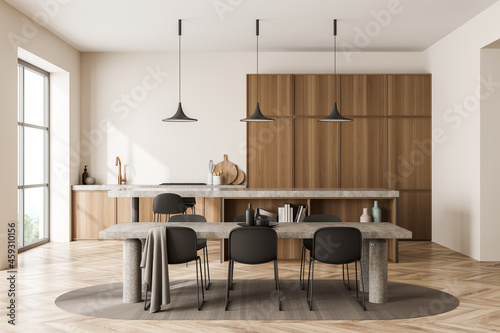 Bright kitchen room interior with dining table, six chairs © ImageFlow