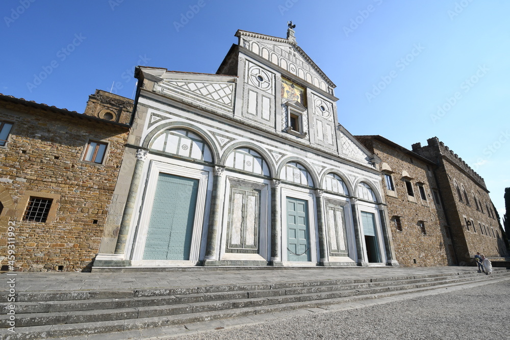 The facade of the famous Basilica of San Miniato in Florence. It is one of the best examples of the Florentine Romanesque style.