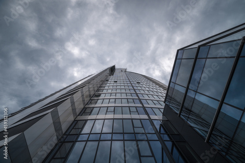 High mirror windows building architecture  abstract image  cloudy background  Europe