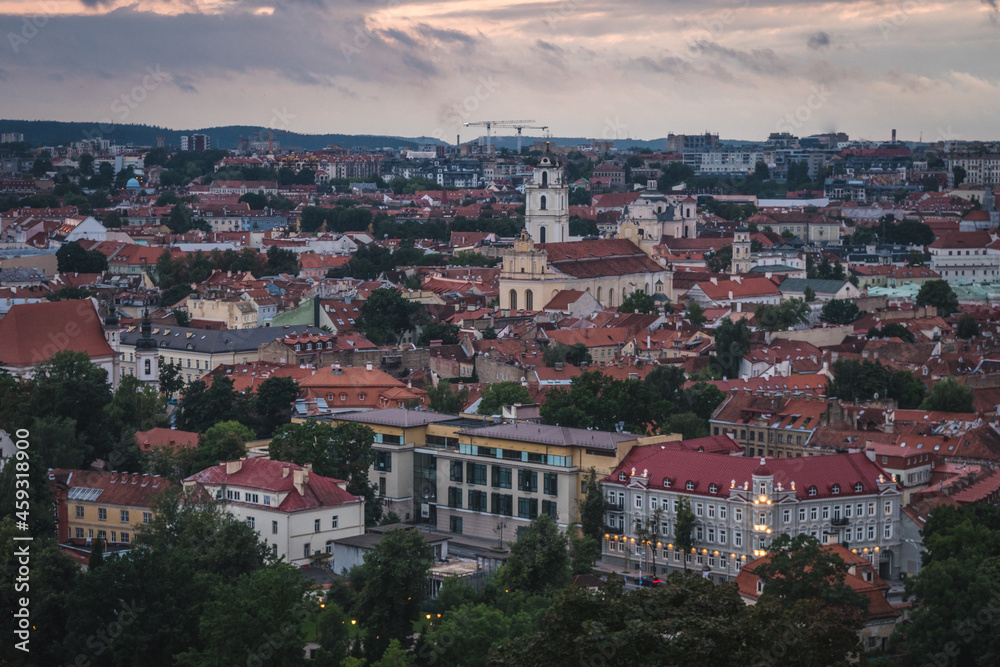 VIlnius / Lithuania - August 12 2021: View over the Old Town of Vilnius in summer at sunsetsunrise, amazing baltic touristic city in Lithuania, Europe
