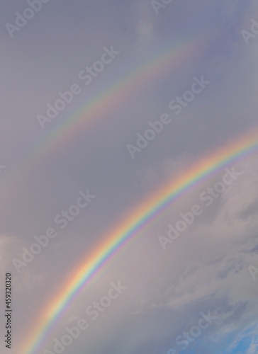 A double rainbow during sunset high resolution