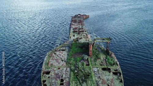 Slow motion, Wreck of Juniata, an old abandoned ship at Inganess Bay on the mainland of Orkney, Scotland. photo