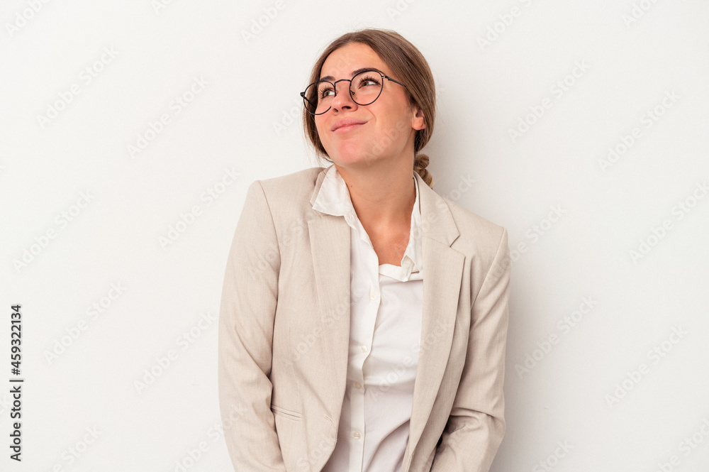 Young Russian business woman isolated on white background dreaming of achieving goals and purposes Young Russian business woman isolated on white background dreaming of achieving goals and purposes