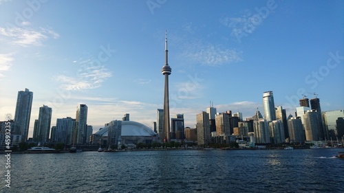 Photo of Toronto Island and Toronto skyline as seen from Toronto Island at day and night. 